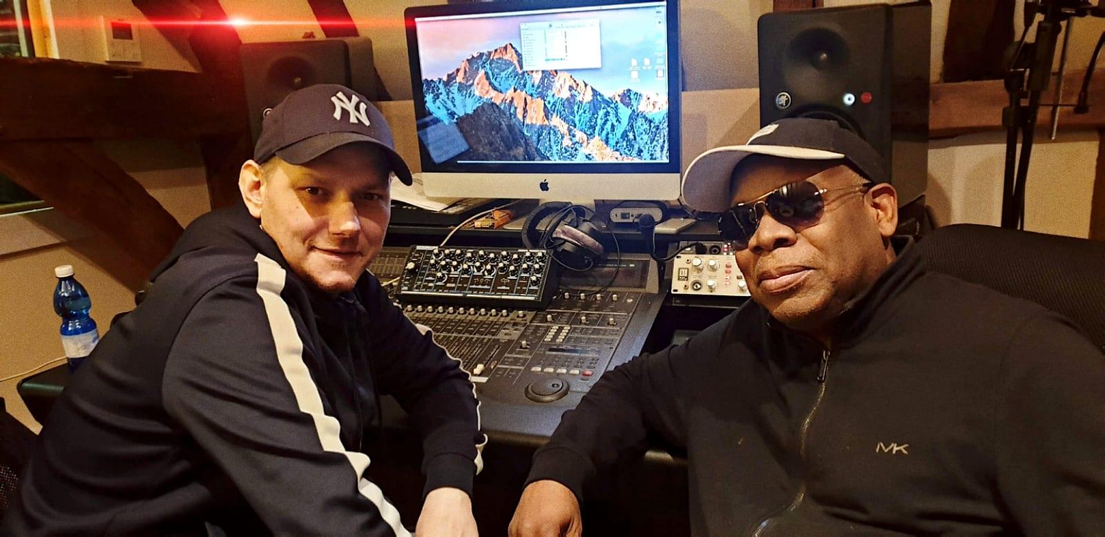 Warren and Joe Smooth at the mixing desk in the studio