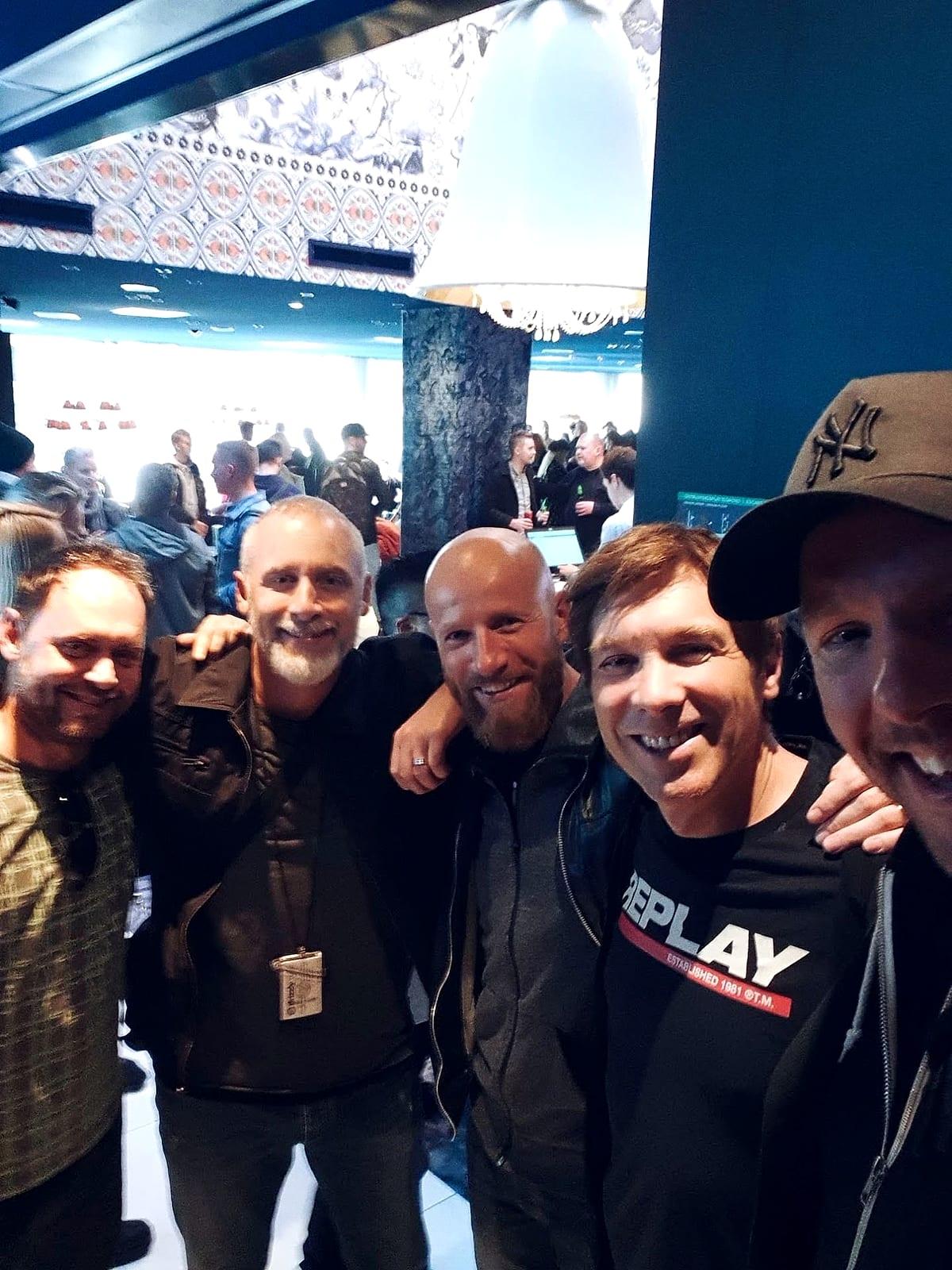 Matt's selfie with a group of DJs and producers in a busy venue