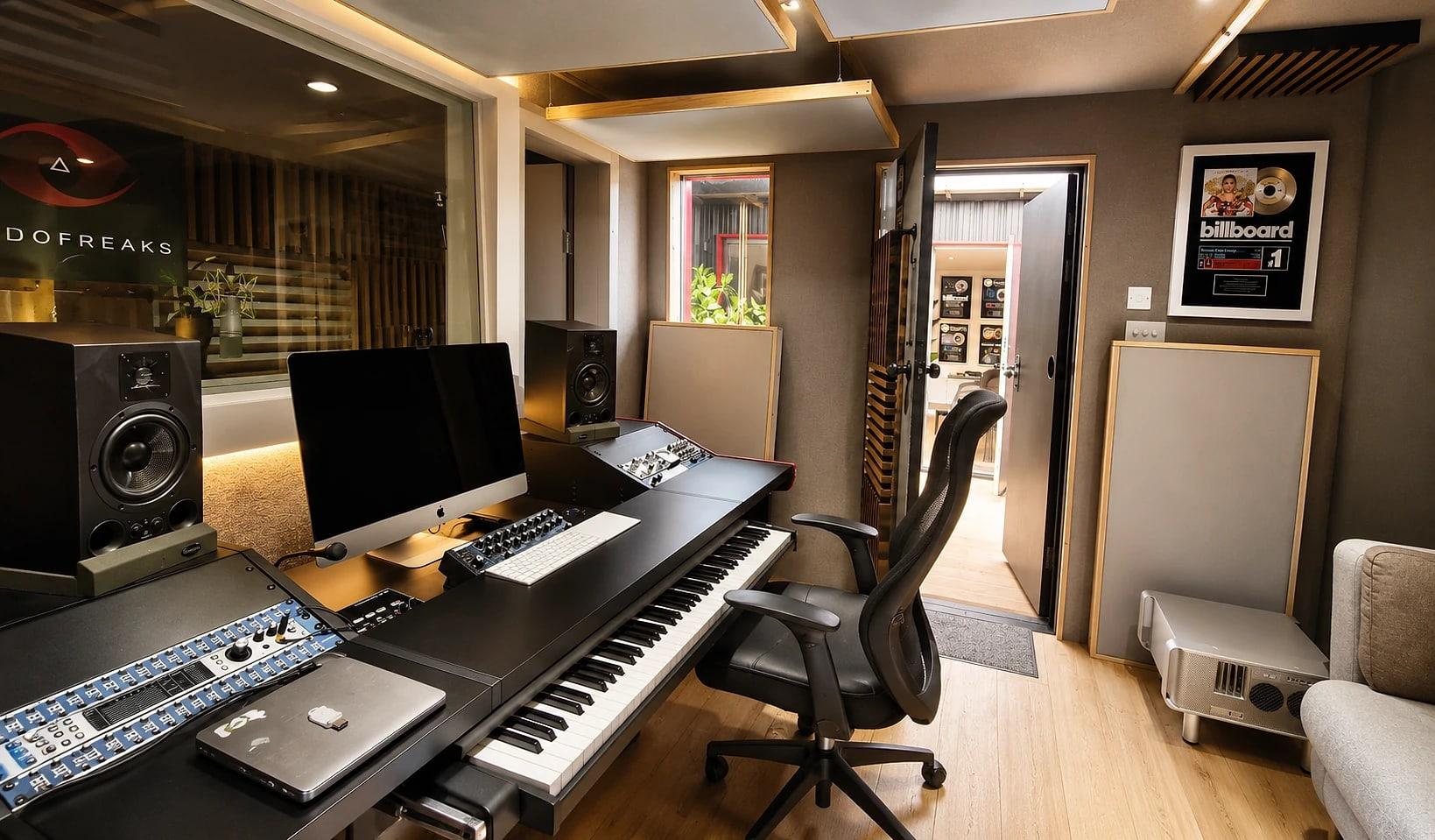 The desk and keys by the booth window, with the Billboard #1 by the door